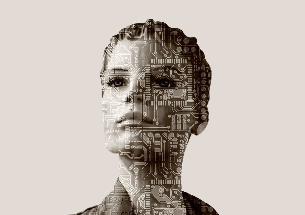 Imagem do rosto de uma mulher sobreposto com terminações de chip